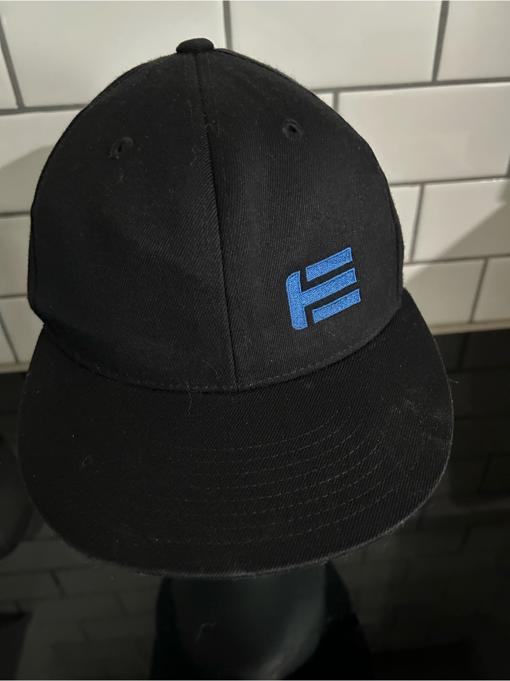 Black Hat with Blue 'E' Logo - Unbranded